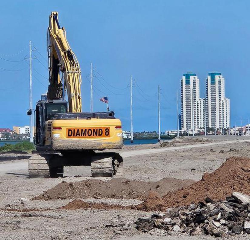 Diamond 8 excavator — waterfront site work, Corpus Christi